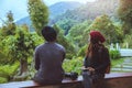 Asian couple travel photograph nature education. nature relax and study read a book. at public park. In Thailand Royalty Free Stock Photo