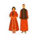 Asian couple wearing traditional chinese costumes. Female character in decorated national dress. Male person in hat and