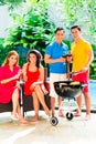 Asian couples having barbecue and drinking wine Royalty Free Stock Photo