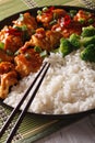 Asian cuisine: chicken in sauce with rice and broccoli closeup. Royalty Free Stock Photo