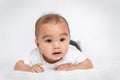 asian cute baby boy on white bed in Royalty Free Stock Photo