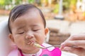 Asian cute baby eating food. Royalty Free Stock Photo