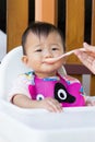 Asian cute baby eating food. Royalty Free Stock Photo