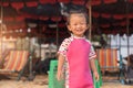 Asian cute baby girl smiling on the beach background.