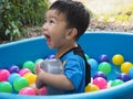 Asian cute child boy playing with dad with happy and funny face.