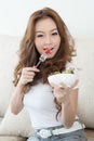 Asian cute girl eating Salad