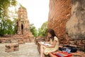 Asian cute girl is study and drawing at archaeological site,field trip,A trip outside