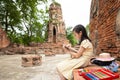 Asian cute girl is study and drawing at archaeological site,field trip,A trip outside