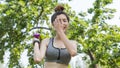 Asian cute healthy fit and firm slim girl happy to standing workout with small dumbbell in position bicep curls lifting  at Royalty Free Stock Photo