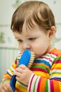 Boy after bath with comb