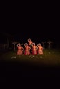 Asian dancers take pose with dance movements while performing the traditional dance in the competition Royalty Free Stock Photo
