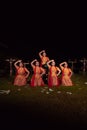Asian dancers take pose with dance movements while performing the traditional dance in the competition Royalty Free Stock Photo
