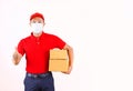 Asian Delivery man in red cap and t-shirt uniform with face mask hold empty cardboard box Service quarantine pandemic coronavirus