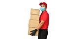 Asian delivery man wearing face mask and gloves in red uniform delivering parcel box isolated on white background during COVID-19 Royalty Free Stock Photo