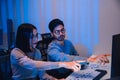 asian developer discussion about ai programing coding project in the night at office