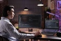 Asian developer using binary code