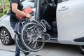 Asian disability woman on wheelchair getting in her car, Accessibility concept Royalty Free Stock Photo