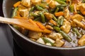 Asian dish of chicken, carrots with green beans Royalty Free Stock Photo