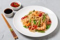 Asian dish of fried rice noodles with shrimp and vegetables Royalty Free Stock Photo