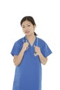 Beautiful Asian woman doctor or nurse wearing scrubs Royalty Free Stock Photo