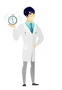 Asian doctor holding alarm clock. Royalty Free Stock Photo