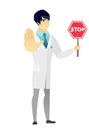 Asian doctor holding stop road sign.