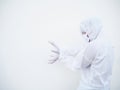 Asian doctor or scientist in PPE suite uniform showing unleash the power by hand with copy space on a white background.