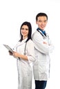 Happy team of two physicians standing back to back with arms fol Royalty Free Stock Photo