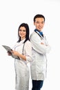 Happy team of two physicians standing back to back with arms fol Royalty Free Stock Photo