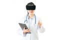 Asian doctor use digital tablet control VR headset screen Royalty Free Stock Photo