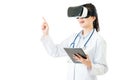 Asian doctor use digital tablet press VR headset screen Royalty Free Stock Photo