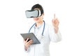 Asian doctor use digital tablet press VR headset screen Royalty Free Stock Photo