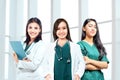 Asian doctor woman team with stethoscope holding a clipboard Royalty Free Stock Photo