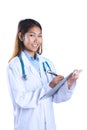 Asian doctor writing on files Royalty Free Stock Photo