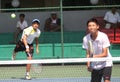 Asian double tennis Royalty Free Stock Photo