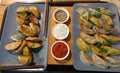 Asian dumplings with spicy dip sauces