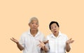 Asian elder old couple unhappy angry with situation copy space