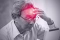 Asian elder pain from headache stress from using tablet Royalty Free Stock Photo