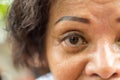 Asian elder women show her eyes and eyebrow tattoo Royalty Free Stock Photo