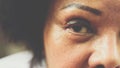 Asian elder women show her eyes and eyebrow tattoo Royalty Free Stock Photo