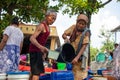 Asian elderly couple collecting relief water during the long dry season