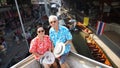 Asian elderly couple having retirment trip to Thailand floating Royalty Free Stock Photo