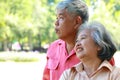 Asian elderly couple relaxing in the park Both of them smiled happily. Royalty Free Stock Photo