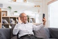 Asian elderly man making video call on smart phone, online call,  digital technology service consultation while staying at home. Royalty Free Stock Photo