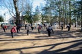 Asian elderly people practicing Tai Chi at public park