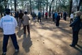 Asian elderly people practicing Tai Chi at public park