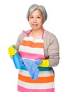 Asian elderly woman use of detergent fo cleaning Royalty Free Stock Photo