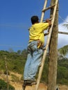 Asian electricity worker