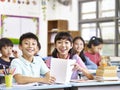 Asian elementary school students in classroom Royalty Free Stock Photo