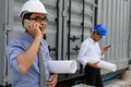 Engineer team using smartphone at construction site Royalty Free Stock Photo